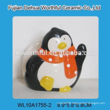 Promotional ceramic napkin holder in penguin shape